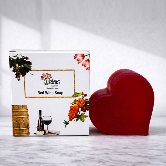 Red wine soap with packaging on a marble surface