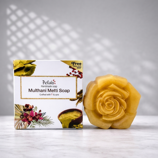 Multani Metti Soap with packaging on a light gray background